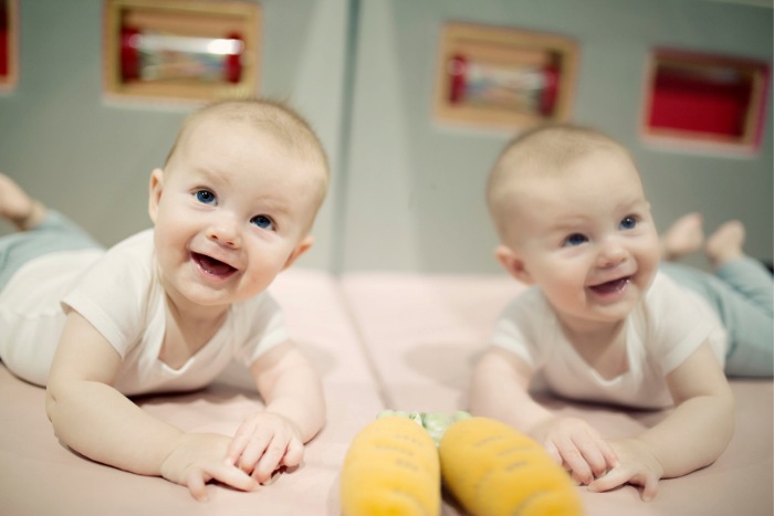 Play ideas for triplets and twins under 6 months of age play ideas for 5 month old twins