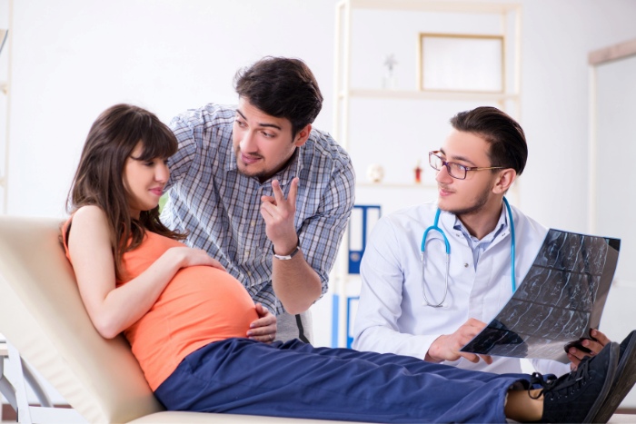 when find out pregnant with triplets