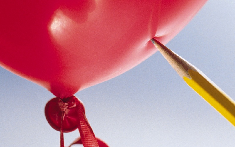 “Embracing” a twin pregnancy balloon pop gender reveal for twins
