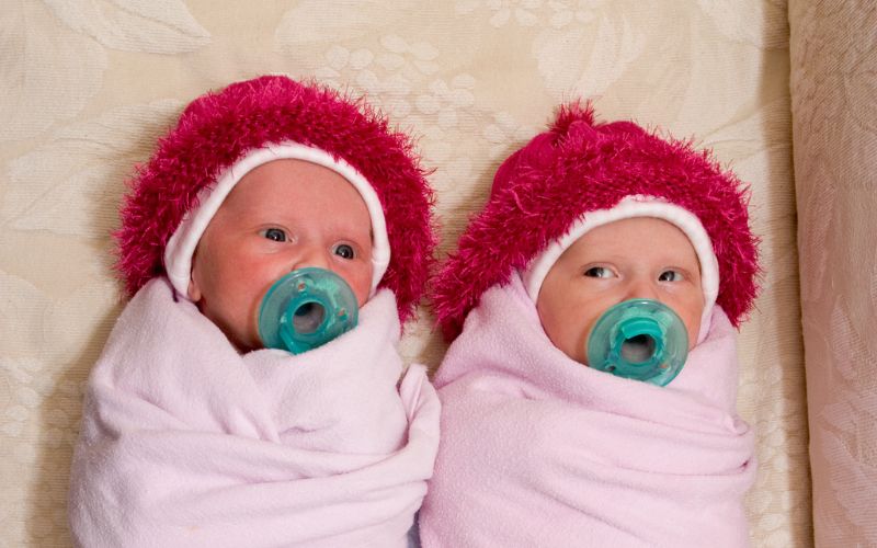 Unwrapping your babies- When to stop wrapping twins and triplets? When should I stop wrapping my twins
