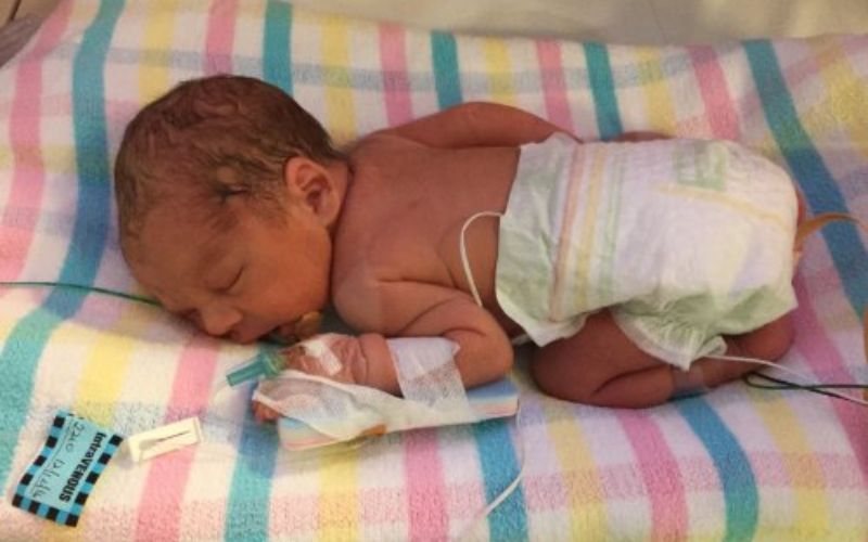 I gave birth vaginally to one twin (in the toilet). The second twin was born by caesarean. Twins born at 32 weeks 4 days